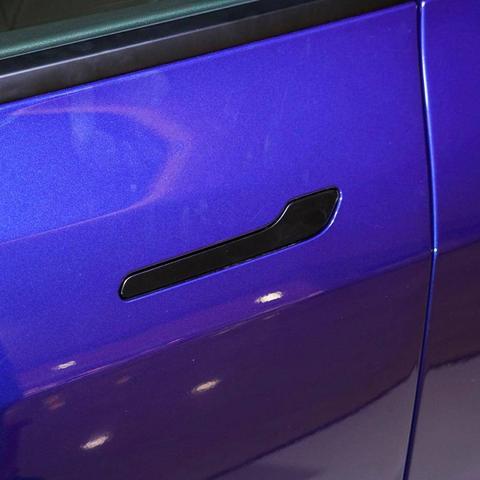 特斯拉Model 3升级揭秘：黑化车标新摄像头，性能再升级